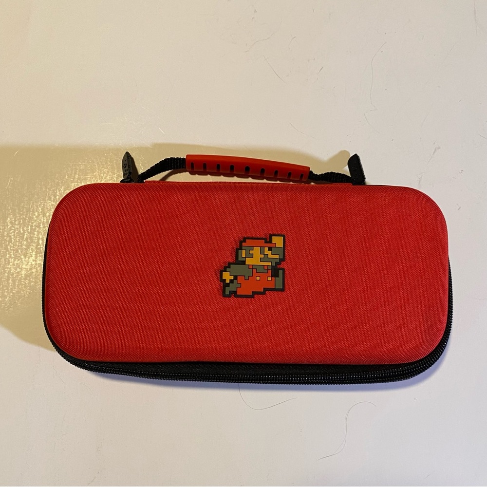 Nintendo Switch canvas case with zip pocket NWOT, 8-Bit Super Mario logo…